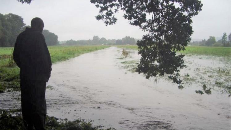 Eine Grünfläche in Hasbergen wird regelmäßig überschwemmt, wenn der Wilkenbach über die Ufer tritt. Die Bürgerinitiative fragte alle Bürgermeisterkandidaten, ob sie im Flächennutzungsplan eine Anpassung vornehmen wollen, damit dort künftig kein Gewerbegebiet entsteht.