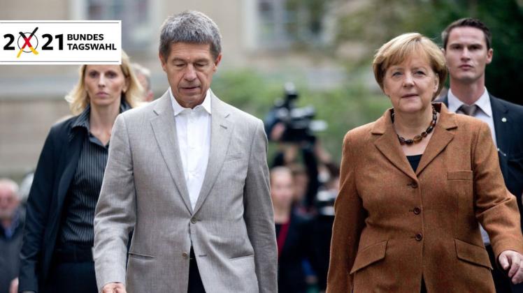 Angela Merkel und ihr Ehemann Joachim Sauer (links) – nach der Bundestagswahl dürften die beiden wieder mehr Zeit füreinander haben.