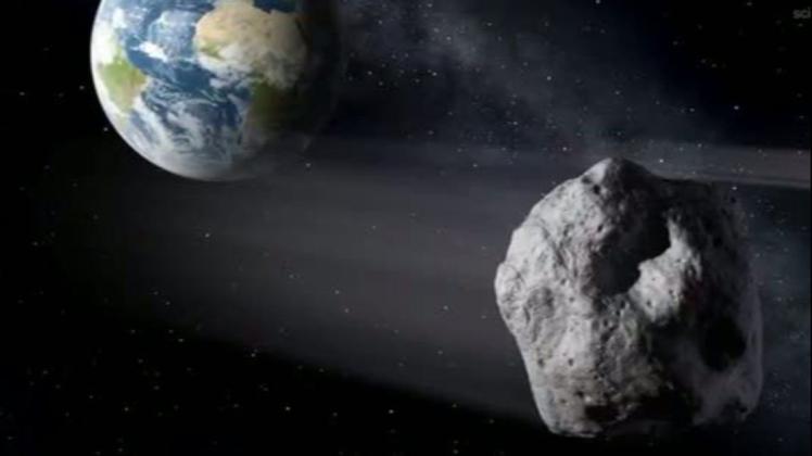 Dreimal näher als der Mond wird der Asteroid 2011 ES4 die Erde passieren. (Illustration)