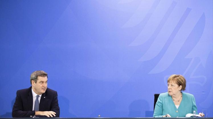 Bayerns Ministerpräsident Markus Söder und Bundeskanzlerin Angela Merkel bei einer Pressekonferenz in Berlin am Mittwoch.