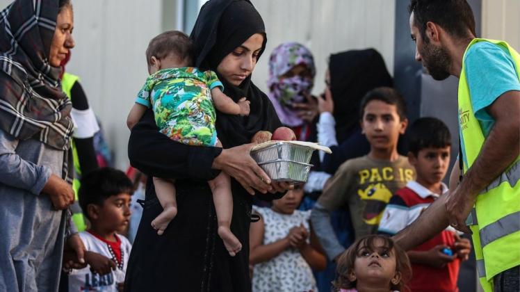 Flüchtlinge auf Lesbos. Foto: Valery Sharifulin/imago images/ITAR-TASS