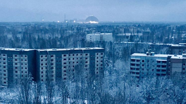 Blick auf Prypjat – im Hintergrund ist das Akw zu sehen. Foto: imago images / Cheryl L.Reed