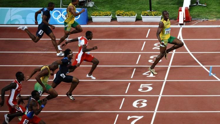 Vorbildlich: Usain Bolt hält sein soziales Umfeld auf Abstand. Foto: Nicolas ASFOURI / AFP
