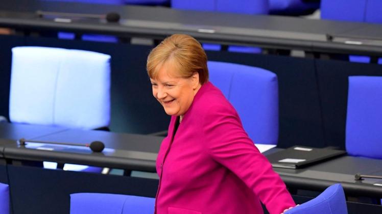 Lächeln in Corona-Zeiten: Bundeskanzlerin Angela Merkel am Donnerstag im Bundestag.