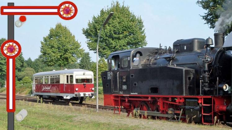 Originelle Fotomontage des Kleinbahn-Vereins: Triebwagen und Dampflok in Harpstedt vom Corona-Halt gestoppt.