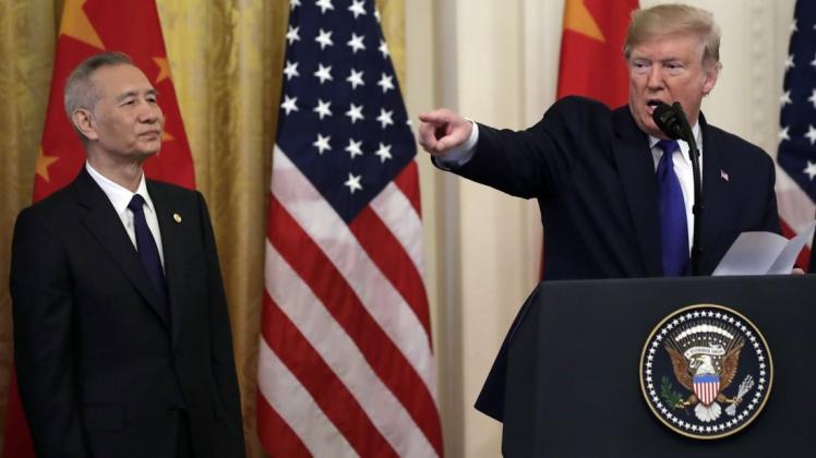 US-Präsident Donald Trump und Liu He, Vizepremier von China. Foto: dpa/Evan Vucci
