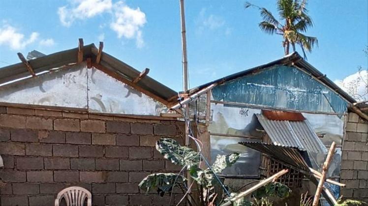 e28ea7846783d21616e63511e90016a7.jpeg Durch den Taifun Phanfone beschädigte Häuser in der philippinischen Provinz Iloilo.