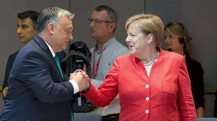 Angela Merkel und Viktor Orban bei einem EU-Gipfel im Juni. 