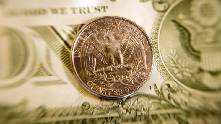 Eine Vierteldollar-Münze wiegt  5,67 Gramm. Foto: imago images/Arnulf Hettrich