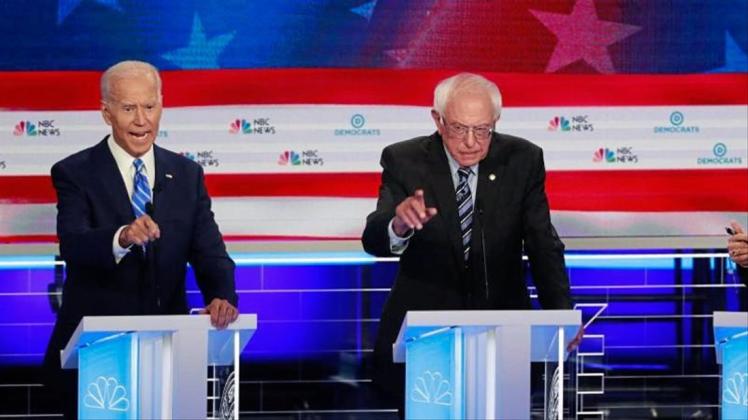 In der ersten TV-Debatte der demokratischen Präsidentschaftsbewerber für die US-Wahl 2020 stellten sich der ehemalige Vizepräsident Joe Biden (l-r), Senator Bernie Sanders und Senatorin Kamala Harris kritischen Fragen. 