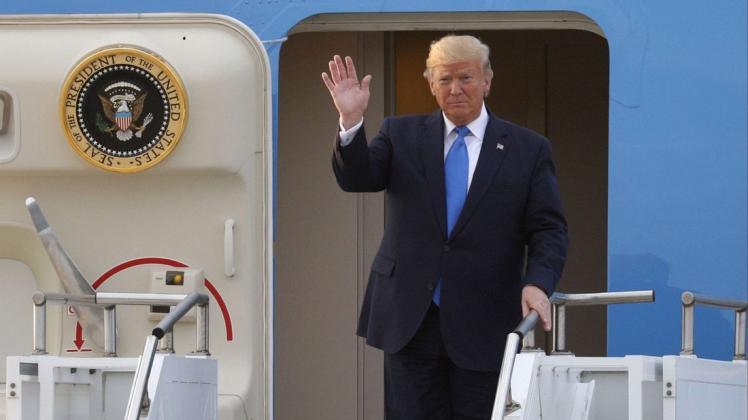 Donald Trump trifft 2017 zum ersten Mal in Deutschland ein. Foto: Ryu Seung-Il/ZUMA Wire/dpa