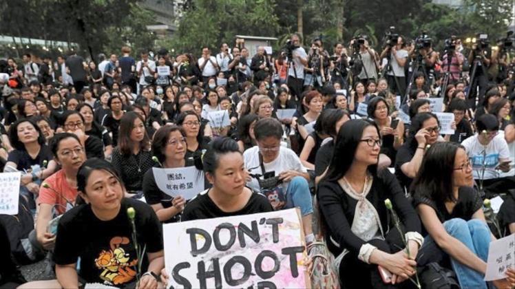 Mütter demonstrieren gegen die Änderung des Auslieferungsgesetzes nach dem gewalttätigen Protesten in Hongkong. 
