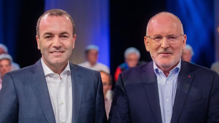 Manfred Weber (l.), Spitzenkandidat der Europäischen Volkspartei (EVP), und Frans Timmermans, Spitzenkandidat der Sozialdemokraten bei der Europawahl. Foto: dpa/Rolf Vennenbernd