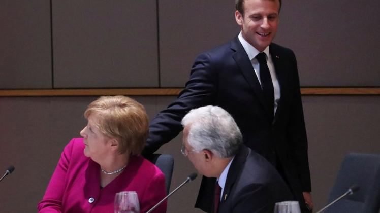 Frankreichs Präsident Emmanuel Macron und Bundeskanzlerin Angela Merkel sind sich bei der Auswahl des neuen EU-Kommissionspräsidenten nicht einig. Foto: dpa/Yves Herman