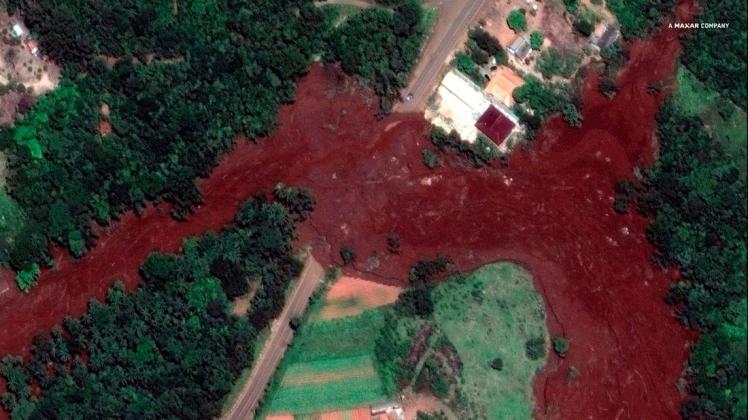 Links der Tagebau, rechts der Dammbruch: Die Ausmaße der Schlammlawine in Brasilien sind gewaltig. Foto: dpa/DigitalGlobe