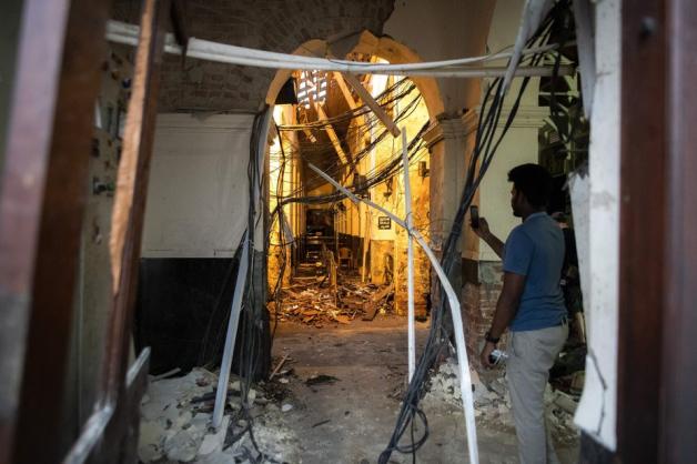 Die Wucht der Explosion lässt sich an der Ruine erahnen. Foto: AFP/Jewel SAMAD