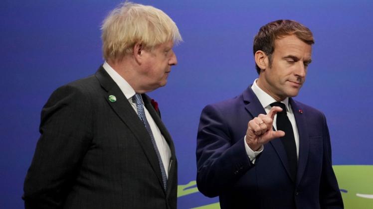 Der britische Premierminister Johnson (links) und Frankreichs Präsiden Macronn trafen am Montag in Glasgow aufeinander.