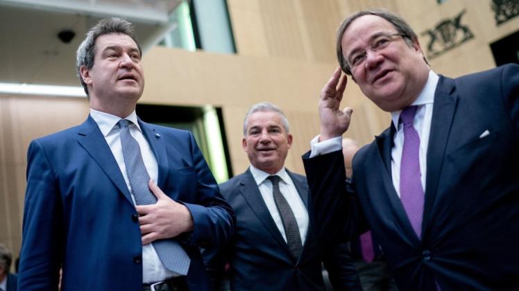 CDU-Chef Armin Laschet (r.) hat den unionsinternen Machtkampf um die Kanzlerkandidat gegen CSU-Chef Markus Söder (l.) für sich entschieden. CDU-Chef Armin Laschet (r.) hat den unionsinternen Machtkampf um die Kanzlerkandidat gegen CSU-Chef Markus Söder (l.) für sich entschieden.