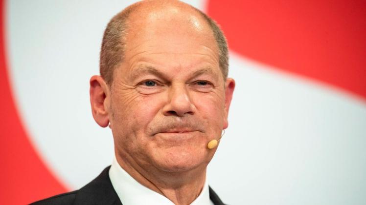Am Ziel: Olaf Scholz am Wahlabend im Willy-Brandt-Haus in Berlin. Dass die SPD die Bundestagswahl gewinnen und Scholz Kanzler werden würde, galt lange als so gut wie unmöglich. Doch Scholz und seine Genossen haben alle überrascht. Am Ziel: Olaf Scholz am Wahlabend im Willy-Brandt-Haus in Berlin. Dass die SPD die Bundestagswahl gewinnen und Scholz Kanzler werden würde, galt lange als so gut wie unmöglich. Doch Scholz und seine Genossen haben alle überrascht.