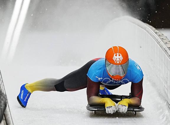 (220212) -- BEIJING, Feb. 11, 2022 -- Christopher Grotheer of Germany competes after skeleton men heat of Beijing 2022 W