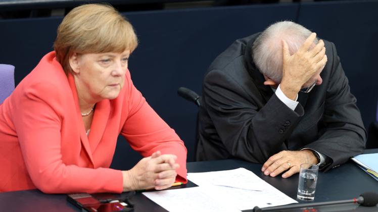 Gefühllos und herrschsüchtig - so sehen einige Griechen Bundeskanzlerin Angela Merkel und Bundesfinanzminister Wolfgang Schäuble (beide CDU).