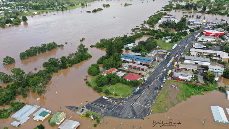 A supplied image shows an aerial view of flooding in Gympie, Queensland, Saturday, February 26, 2022. An SES volunteer is the fourth person killed in floods in Queensland after more than a month's worth of rain fell in 24 hours in parts of the southeast. (AAP Image/Supplied by Brett's Drone Photography) NO ARCHIVING, EDITORIAL USE ONLY, MANDATORY CREDIT