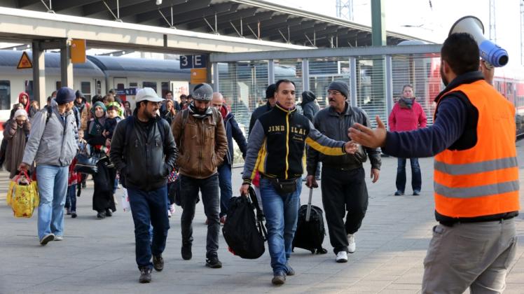 Flüchtlinge kommen in Rostock an.