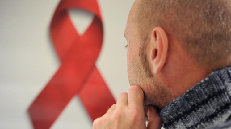 Die rote Schleife ist zum Symbol der Solidarität mit HIV-Positiven und Aids-Kranken geworden.  