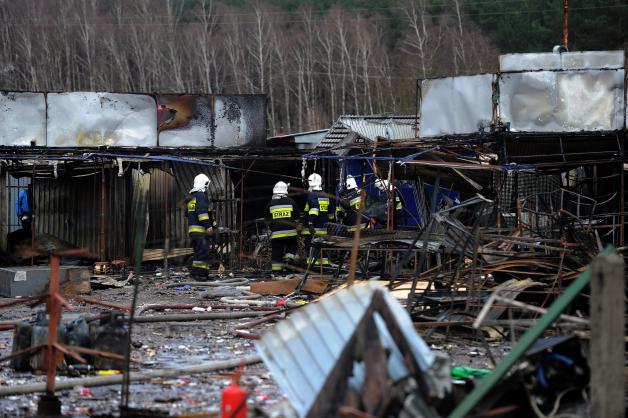 Fire tears through market after fireworks explode Fire tears through market after fireworks explode