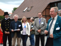 Besuch der Bundeswettbewerb-Jury in Lohmen: Bürgermeister Bernd Dikau (r.) führte die Delegation durch das Dorf.  