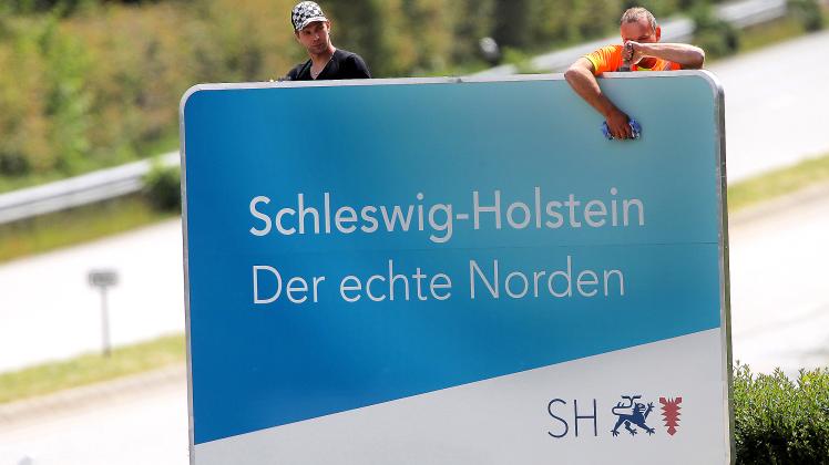 Schild mit Solgan "Schleswig-Holstein. Der echte Norden"