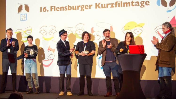  Filmemacher und Jury: (von links) Manuel Francescon, Mona Keil, Jim Lacy, Julia Ritschel und die Jury Hajo Schäfer, Rosa Hannah Ziegler und Achim Englert. 