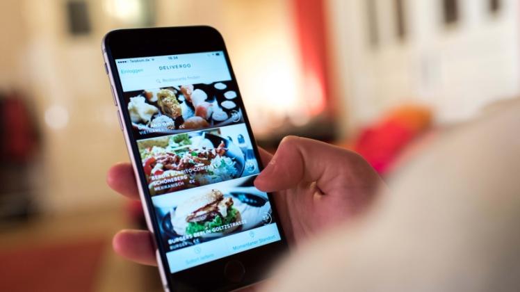 Im Trend: Lieferdienste bringen per App bestelltes Essen von Restaurants zum Kunden.  