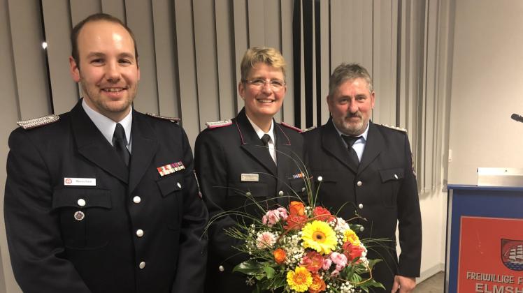 Die neue Elmshorner Wehrchefin Britta Stender mit den Wittenberger Kameraden Marcus Giese und Uwe Kämmrich. 