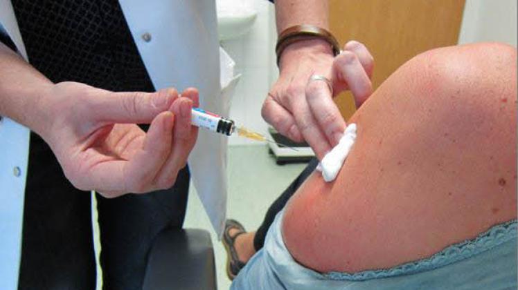 Nur ein Pieks: Die Impfung soll einer Influenza-Erkrankung im  Winter vorbeugen. 