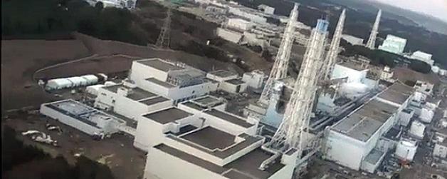 Zerstörte Reaktorgebäude des Kraftwerks Fukushima am Donnerstag aus der Luft. Foto: Tepco/dpa