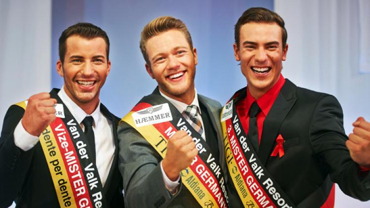 Die drei Schönsten: Mister Germany  Jörn Kamphuis (Mitte),  Mister Baden-Württemberg  Matthias Schettler (links)  und  Mister Brandenburg Erik Vermeulen dapd