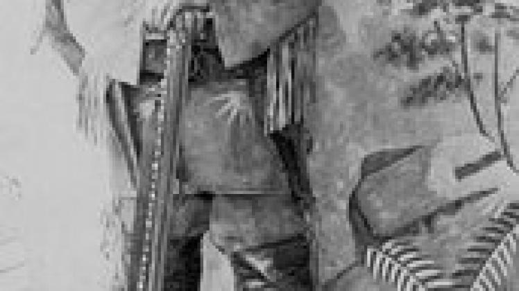 Karl May im Kostüm Old Shatterhands mit der Silberbüchse Foto: Ullstein