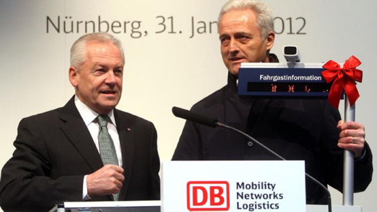 Die Verkünder: Verkehrsminister Peter Ramsauer (r.) und Bahnchef Rüdiger Grube. Foto: dpa