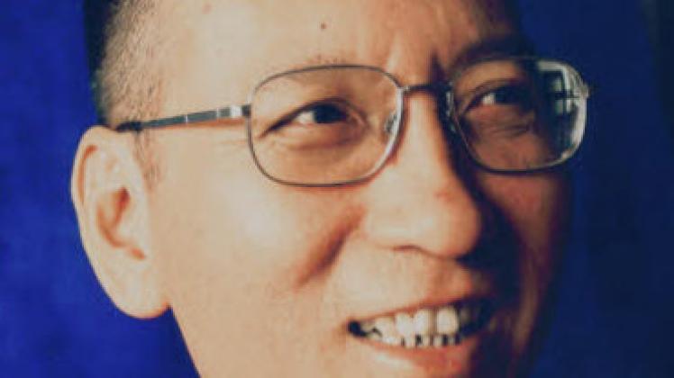 Friedensnobelpreisträger  Liu Xiaobo  darf nicht nach Oslo fliegen; er sitzt im Gefängnis. dpa
