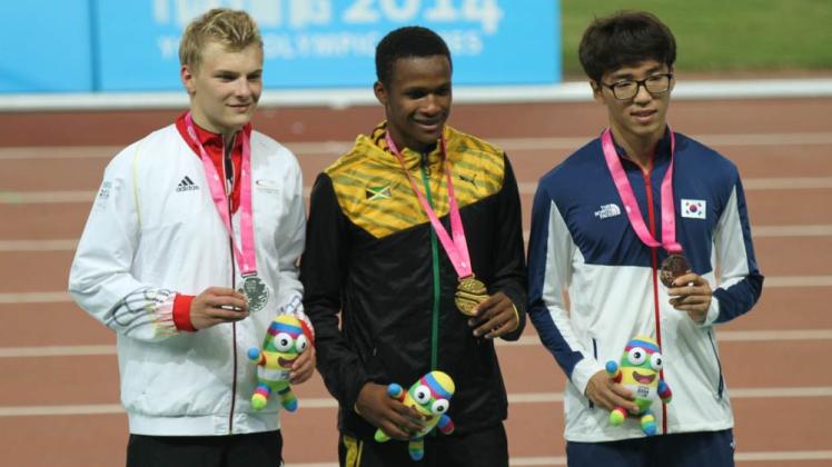 Die drei Medaillengewinner beim Lauf über 110 m Hürden: Henrik Hannemann, Jaheel Hyde und Gyeongtae Kim (von links). 