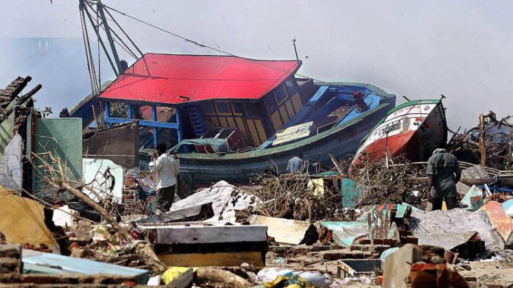 So sah es nach dem Tsunami vor zehn Jahren in vielen Orten aus.  Fotos: dpa 