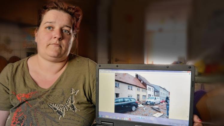 Hilfe ist dringend nötig: Ramona Dorn an einem Laptop – das Bild zeigt ihr zerstörtes Zuhause.  