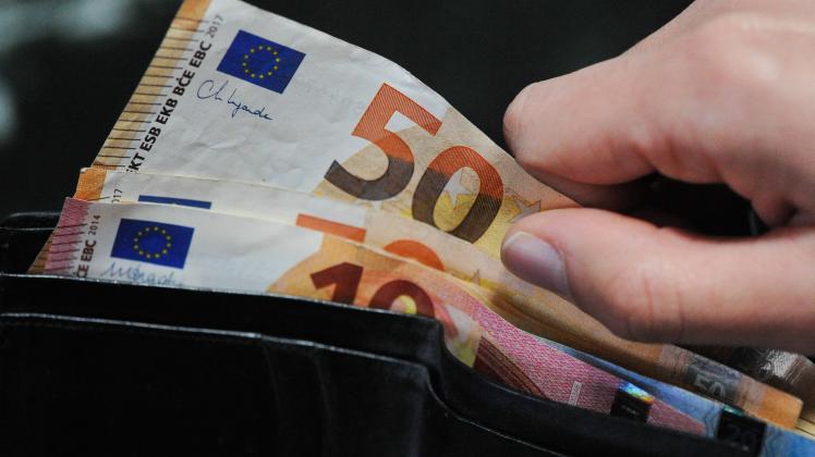 Stop Cash Payments Over Euro 1000 In Italy Euro banknotes in a wallet are seen in L Aquila, Italy, on december 30, 2021