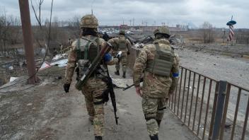Ukrainians Soldiers Walks Toward The Frontline Near Irpin Ukrainians unit walks toward the frontline in Irpin, 20 km fr