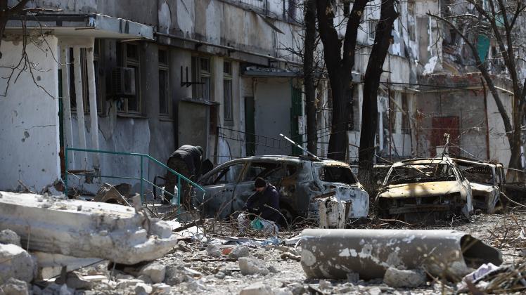 MARIUPOL, UKRAINE - MARCH 28, 2022: A view of the wreckagae of vehicles in the embattled city. The Russian Armed Forces