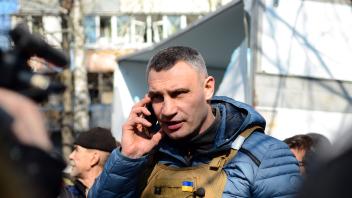 Residential building shelled in Svyatoshyno district of Kyiv Mayor of Kyiv Vitalii Klitschko speaks on the phone outside