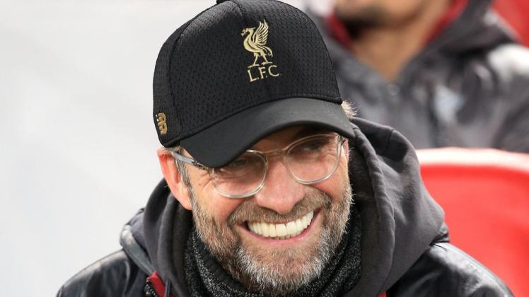 Hat gut Lachen: Trainer Jürgen Klopp steht mit seinem FC Liverpool im Achtelfinale der Champions League. Foto: dpa/Peter Byrne