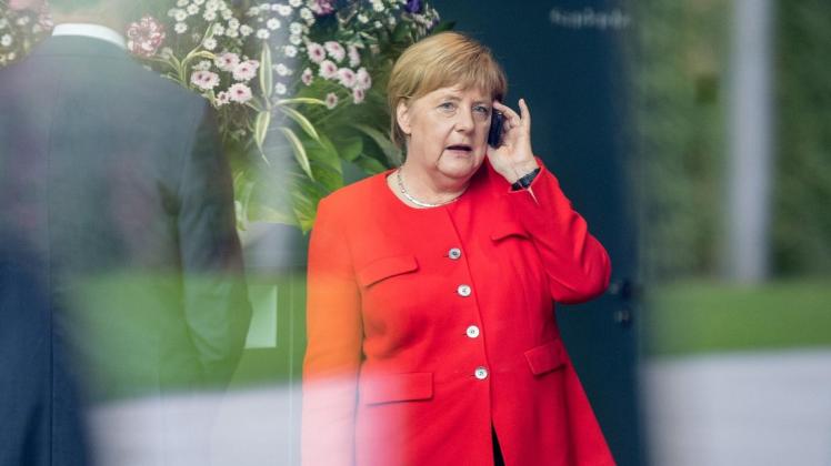 Bundeskanzlerin Angela Merkel (CDU) gibt sich gesprächsbereit angesichts der Koalitionskrise. Foto: Fabian Sommer/dpa