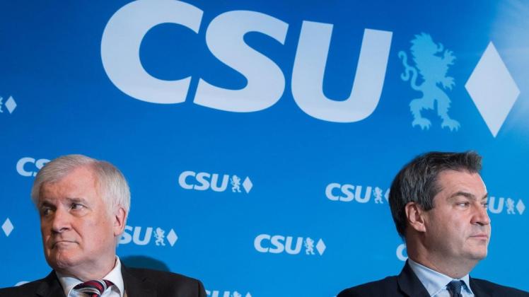 Suchen wohl nach dem Verursacher: Horst Seehofer (l, CSU), Bundesminister für Inneres, Heimat und Bau, und Markus Söder (CSU), Ministerpräsident von Bayern. Foto: Peter Kneffel/dpa